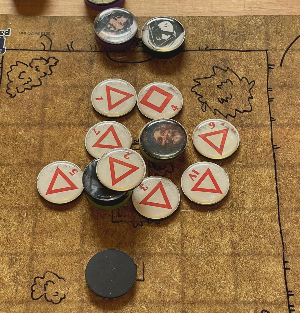 Avilos surrounded by a swarm of spiders.