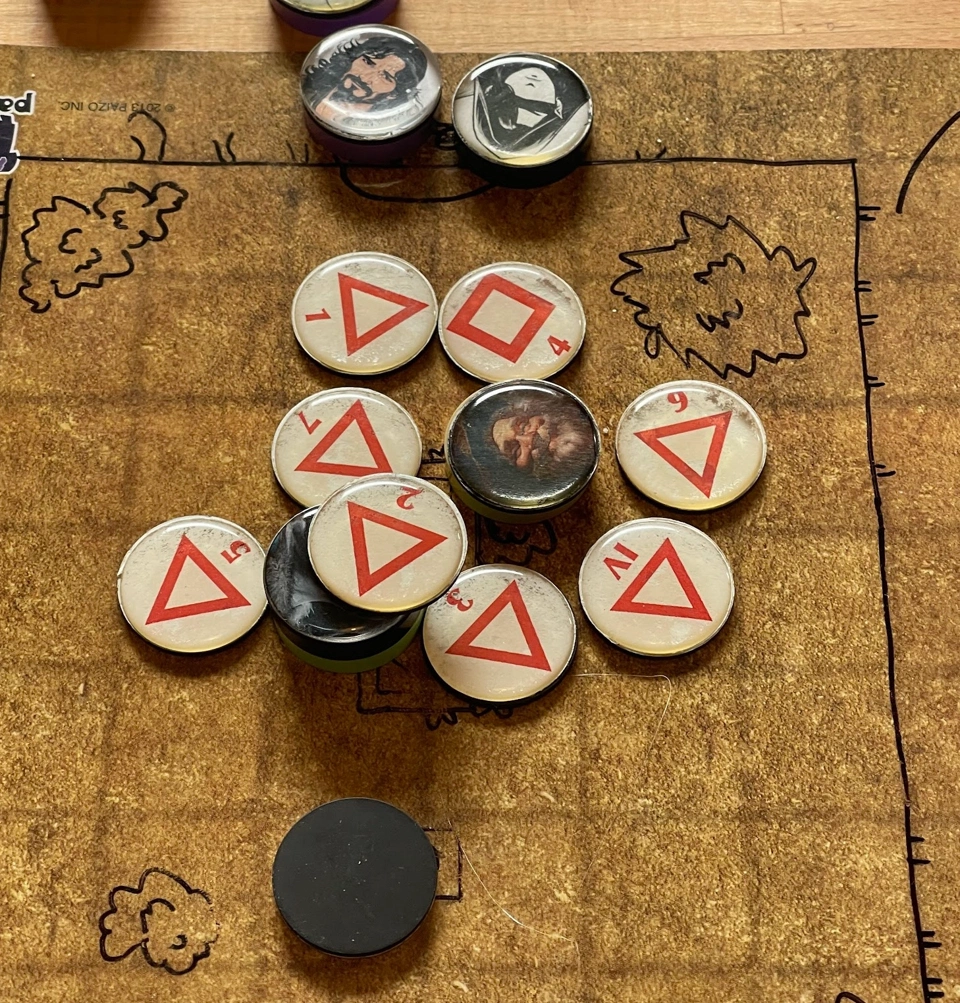 Avilos surrounded by a swarm of spiders.