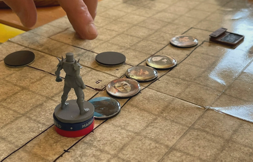 The heroes fighting the flesh golem.