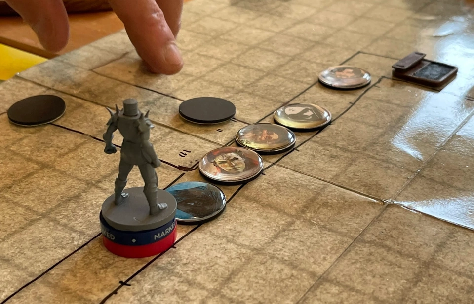 The heroes fighting the flesh golem.