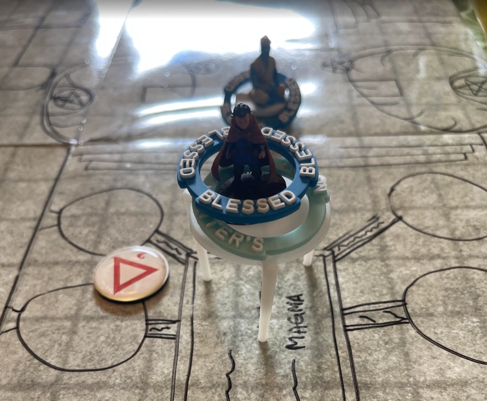 Nemo held upside-down over the magma pool with Soto rushing to his aid.