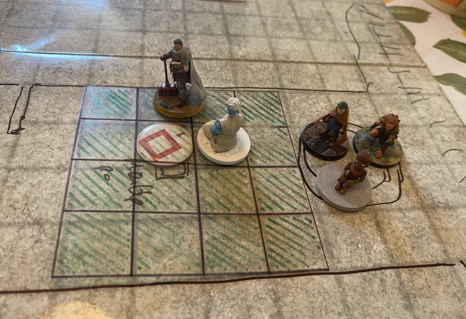 The heroes moments before throwing the mezzoloth off the cliff.
