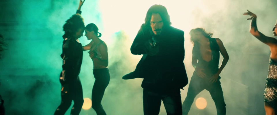 John chasing after Killa Harkan in his Berlin club.