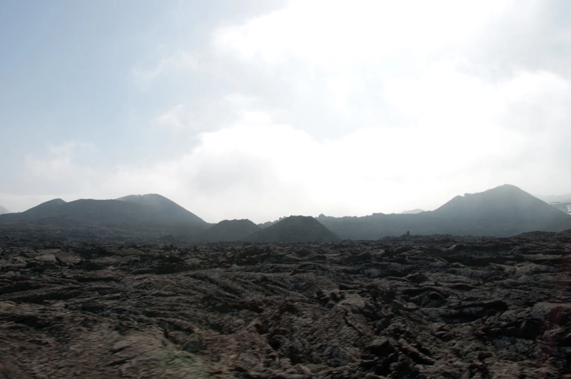 Lanzarote is a volcanic island of 80km long by 25km wide and, at one point in the last 200 years or so, one fourth of its surface was covered with magma from the last big eruption in the island. During our visit to Timanfaya Park, shown above, we could confirm first hand the out-of-this-world feeling of the resulting landscape.