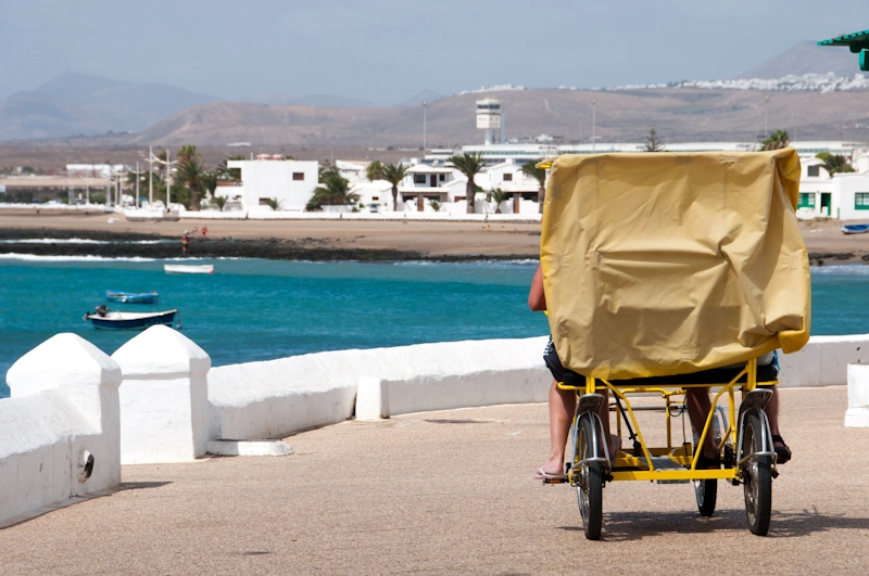 Yellow pedal based vehicles packed to the roofs with bright red skinned British and Germans. Little kids would use the horn whenever we passed by them and a second later the whole shrimp family would giggle all at once.