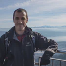 /attachments/trips/bye-bye-california-welcome-switzerland/man-standing-in-front-of-swiss-mountains-at-uetliberg-zurich_hu6258121577665162066.webp