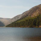 /attachments/trips/irelands-glendalough/glendalough-upper-lake-and-miners-village_hu4312547454763792836.webp